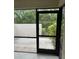 View from screened patio to fenced garden at 7030 W Country Club N Dr # 128, Sarasota, FL 34243