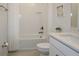 Clean bathroom with a white subway tile shower/tub combination and a vanity with a white countertop at 12525 Lily Quartz Loop, Parrish, FL 34219