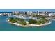 Beautiful aerial view of a marina with many boats docked and a city skyline backdrop at 2264 Floyd St, Sarasota, FL 34239