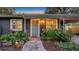 Charming home featuring a beautifully landscaped front yard and inviting front door at 2264 Floyd St, Sarasota, FL 34239