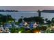 Evening view of a marina filled with yachts and sailboats, with a serene waterfront backdrop at 2264 Floyd St, Sarasota, FL 34239