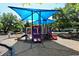 Colorful playground area with slides and covered play structures for children to enjoy at 2264 Floyd St, Sarasota, FL 34239