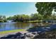 A bridge extends across the pond, complete with a path and a spraying fountain at 2264 Floyd St, Sarasota, FL 34239