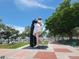 A romantic bronze statue by the bay offers photo opportunities against a vibrant cityscape at 2264 Floyd St, Sarasota, FL 34239