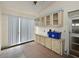 Versatile bonus room with storage cabinets, natural light, and exterior access at 4531 13Th E St, Ellenton, FL 34222