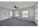 Bright Florida room with carpeting, a ceiling fan, and windows providing ample natural light at 4531 13Th E St, Ellenton, FL 34222
