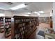 Community library with extensive bookshelves and reading space with tile flooring at 4531 13Th E St, Ellenton, FL 34222