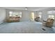 Inviting living room with neutral-toned furniture, soft lighting, and an open layout at 4531 13Th E St, Ellenton, FL 34222