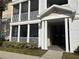 Exterior view of the building entrance featuring the balcony and staircase at 4802 51St W St # 521, Bradenton, FL 34210