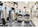 Bright community gym with multiple machines and a ceiling fan at 4802 51St W St # 521, Bradenton, FL 34210