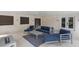 Relaxing outdoor space with cozy furniture, a fire pit, and stylish design details for ultimate comfort at 6605 Gulf Dr, Holmes Beach, FL 34217