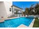 Backyard pool and spa area featuring a covered outdoor living space, perfect for relaxation and entertainment at 6605 Gulf Dr, Holmes Beach, FL 34217