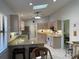 Well-lit kitchen with modern appliances, granite countertops, and a functional layout at 7363 Silver Fern Blvd # 80, Sarasota, FL 34241