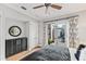 Bedroom with neutral colors, hardwood floors, and french doors leading to the outdoor patio at 8388 Catamaran Cir, Lakewood Ranch, FL 34202