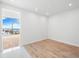 Light and airy bedroom with hard wood flooring and beautiful view at 111 Golden Gate Pt # 701Ph, Sarasota, FL 34236