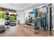 Modern gym features weights, exercise balls, and plenty of room to workout at 111 Golden Gate Pt # 701Ph, Sarasota, FL 34236