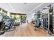 Well-equipped gym with modern fitness equipment and natural light at 111 Golden Gate Pt # 701Ph, Sarasota, FL 34236