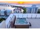 Relax in this rooftop hot tub with spectacular sunset and bay views at 111 Golden Gate Pt # 701Ph, Sarasota, FL 34236