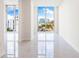 Bright living area with large windows offering great views at 111 Golden Gate Pt # 701Ph, Sarasota, FL 34236