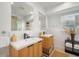 Modern bathroom featuring double sinks, sleek fixtures, and contemporary design at 203 72Nd St, Holmes Beach, FL 34217