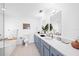Beautiful bathroom featuring double sinks, a soaking tub, and modern fixtures at 203 72Nd St, Holmes Beach, FL 34217