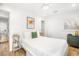 Bright bedroom with neutral tones, minimalist decor, and modern furnishings at 203 72Nd St, Holmes Beach, FL 34217