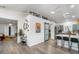 Open concept living area featuring stylish decor, modern kitchen and lots of natural light at 203 72Nd St, Holmes Beach, FL 34217