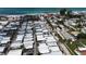 Aerial view of a coastal community with charming homes near a stunning beach and ocean at 2601 Gulf N Dr # S2, Bradenton Beach, FL 34217