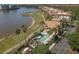 Overhead view of the pool, golf course, and waterfront, offering a sense of leisure and luxury at 6310 Watercrest Way # 201, Lakewood Ranch, FL 34202
