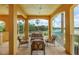 Inviting balcony with ample seating, perfect for enjoying the lush landscape and a tranquil view at 6310 Watercrest Way # 201, Lakewood Ranch, FL 34202