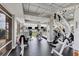 Fitness center with state-of-the-art equipment and scenic lake views, offering a premium workout experience at 6310 Watercrest Way # 201, Lakewood Ranch, FL 34202