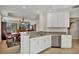 Open kitchen with granite countertops, stainless steel appliances, and dining area at 6310 Watercrest Way # 201, Lakewood Ranch, FL 34202