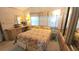 Inviting bedroom featuring a double bed, ample natural light, and built-in storage for comfort and convenience at 3333 26Th E Ave # 1219, Bradenton, FL 34208