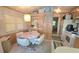 Warm dining area with built in cabinets and adjacent kitchen offers a comfortable and inviting space at 3333 26Th E Ave # 1219, Bradenton, FL 34208