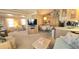 Bright, open-concept living area with a cozy kitchen, dining area, and comfortable living room at 3333 26Th E Ave # 1219, Bradenton, FL 34208