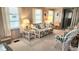Cozy living room with neutral tones, comfortable seating, and natural light from multiple windows at 3333 26Th E Ave # 1219, Bradenton, FL 34208