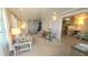 Inviting living room with comfortable seating, natural light, and seamless transition to the kitchen at 3333 26Th E Ave # 1219, Bradenton, FL 34208