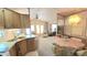 Cozy living room and dining area with comfortable seating and natural light from large windows at 3333 26Th E Ave # 1219, Bradenton, FL 34208