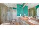 Beautiful bathroom with dual sinks, marble countertop, walk-in shower and custom painted walls at 3625 Casey Key Rd, Nokomis, FL 34275