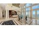 Bright and airy living room with French doors leading to a terrace at 3625 Casey Key Rd, Nokomis, FL 34275
