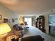 Spacious living room features comfortable seating, a coffee table, and access to the outdoor balcony at 3682 Lake Bayshore Dr # K402, Bradenton, FL 34205