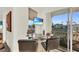 Cozy bar area with seating and serene water views at 550 Yardarm Ln, Longboat Key, FL 34228