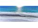 Beautiful beach with clear blue water and white sand at 550 Yardarm Ln, Longboat Key, FL 34228