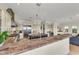 Well-equipped kitchen with granite countertops, modern appliances, and a breakfast bar at 550 Yardarm Ln, Longboat Key, FL 34228