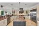 Spacious kitchen featuring granite countertops, stainless steel appliances, and custom cabinetry at 550 Yardarm Ln, Longboat Key, FL 34228