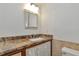 Bathroom with marble countertop and storage underneath the sink at 631 43Rd Street W Blvd, Palmetto, FL 34221