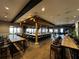 Spacious bar area with ample seating, modern lighting, and an inviting atmosphere at 12826 Sorrento Way, Bradenton, FL 34211