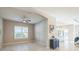 An open-concept living area showcases ample space with views of kitchen and living spaces at 12826 Sorrento Way, Bradenton, FL 34211