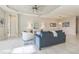 Spacious living room with tile floors, comfortable seating, and bright natural light at 12826 Sorrento Way, Bradenton, FL 34211