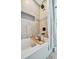 Modern bathroom featuring tiled walls and a soaking tub with shower at 3902 11Th W Ave, Bradenton, FL 34205